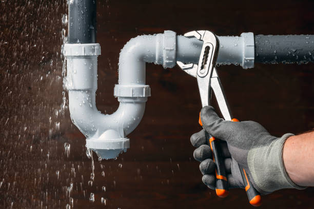 Professional Emergency Plumber technician working in Newdale, ID